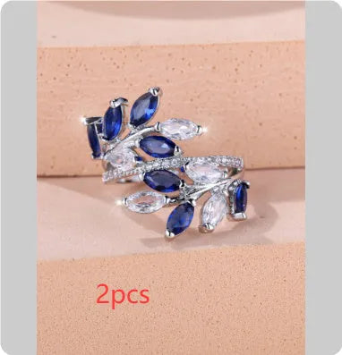 Horse Eye Zircon Leaf Ring with adjustable opening in rose gold purple white diamond colour on a hand