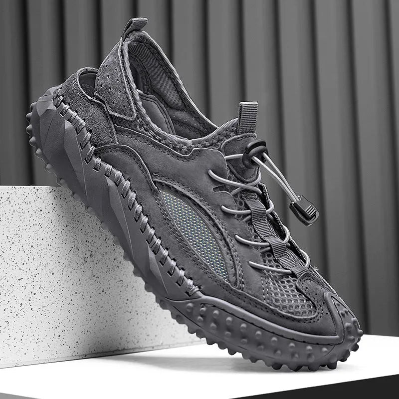 Men's black waterproof sports sandals with leather mesh upper, elastic band, and rubber sole.