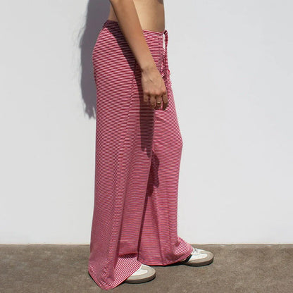 Stylish women's striped pants in various colors with a casual, Y2K-inspired design