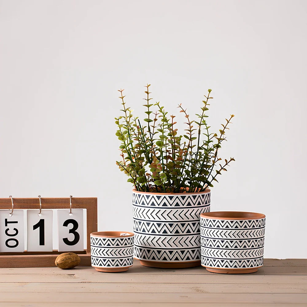 White ceramic geometric flower pot with Nordic design in three sizes for indoor plants