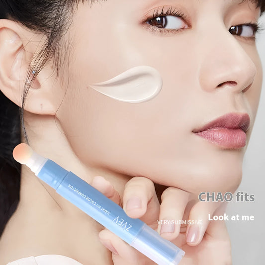 Concealer pen with sponge brush head applicator showing three shade options: brightening, pink flesh, and flesh colour