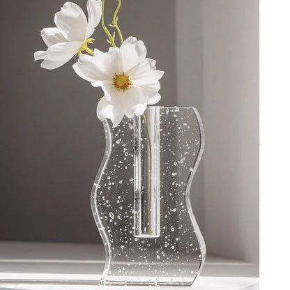 Transparent crystal vase with internal bubble formations measuring 18cm height and 12cm diameter