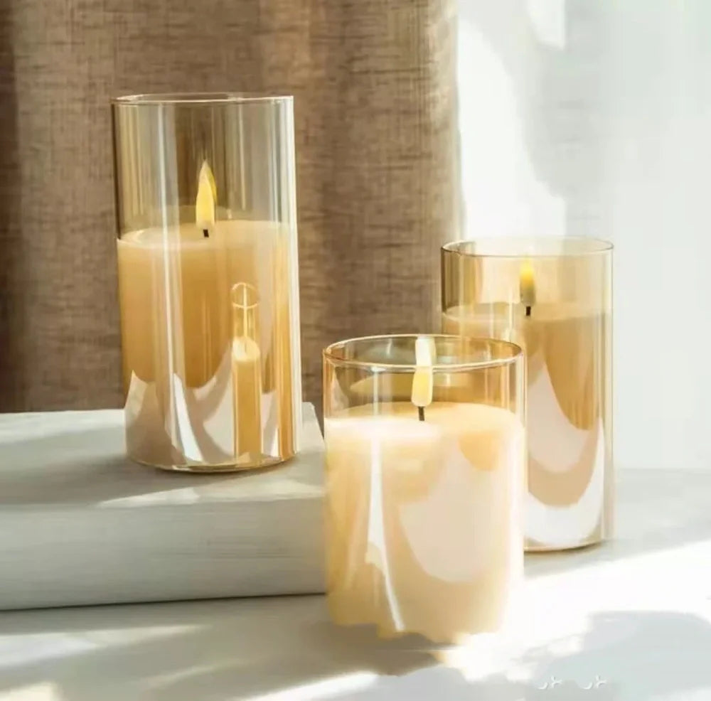Electroplated glass LED electronic candle with gold finish and realistic flame simulation