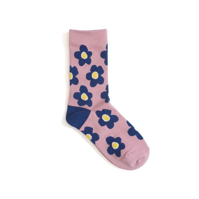 Cozy cotton socks featuring a playful cartoon flower pattern, designed for breathability and comfort.