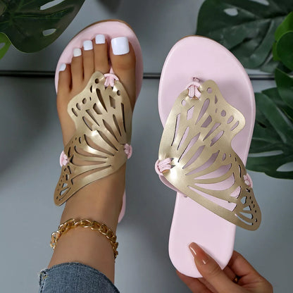 Women's hollow butterfly flip-flops in pink and silver, featuring a lightweight PU upper and rubber sole.