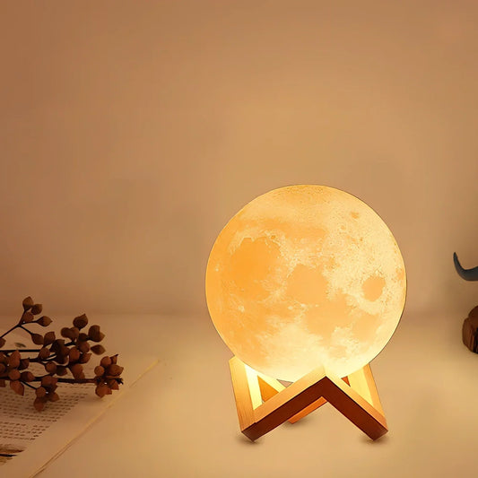 3D-printed moon night table lamp with remote control on wooden holder, showing lunar texture and adjustable brightness aperture