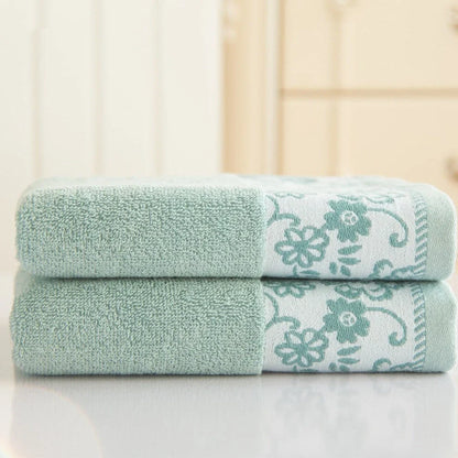 Wisteria flower jacquard cotton towel showing textured surface and 34x73 cm dimensions