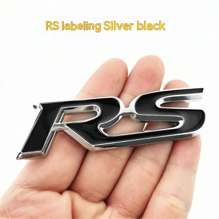 Zinc alloy metal car sticker with RS design measuring 9 by 2.4 centimetres