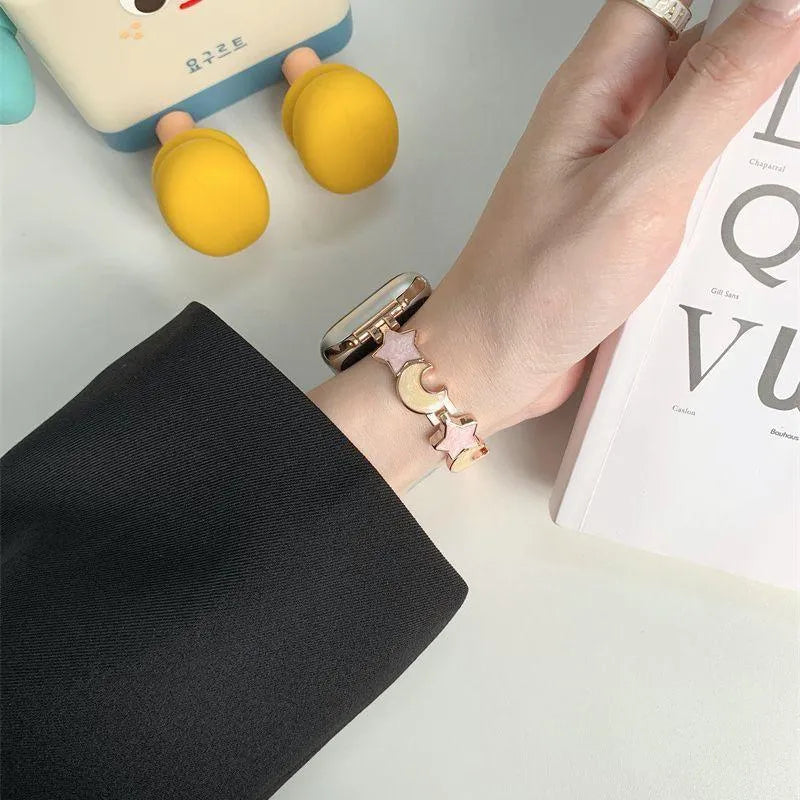 Metal chain Apple Watch strap with snap button, shown in star and moon colour options and two size ranges