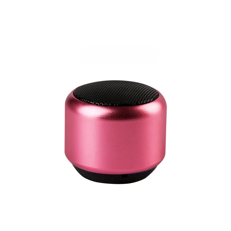 Small portable Bluetooth speaker in black, blue, gold, or pink colour options