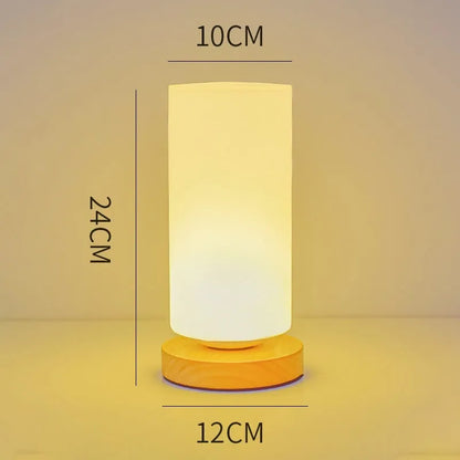 Nordic solid wood USB table lamp with touch dimming, 150x180mm size, and white light shapes on a bedside table