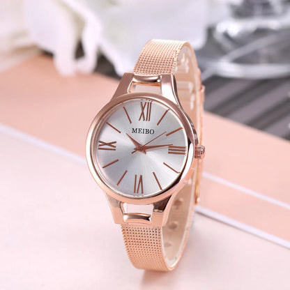 Elegant rose gold women's watch with stainless steel mesh band