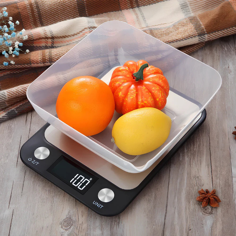 Stainless steel digital kitchen scale with LCD display showing weight measurement