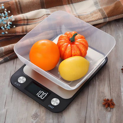Stainless steel digital kitchen scale with LCD display showing weight measurement