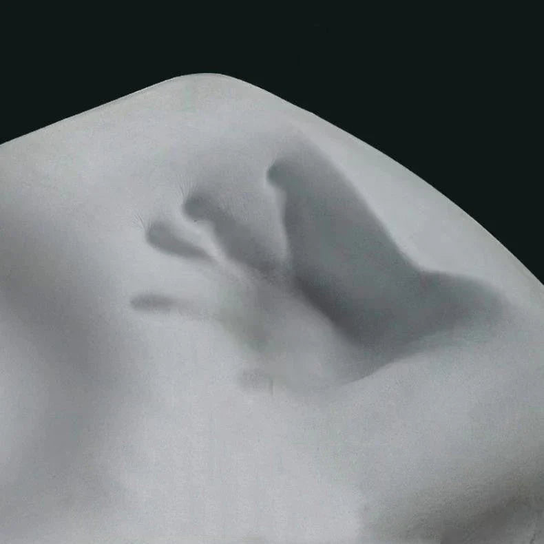 Premium memory foam neck massage pillow with adjustable loft and breathable knitted cotton cover for comfortable, pain-relieving sleep