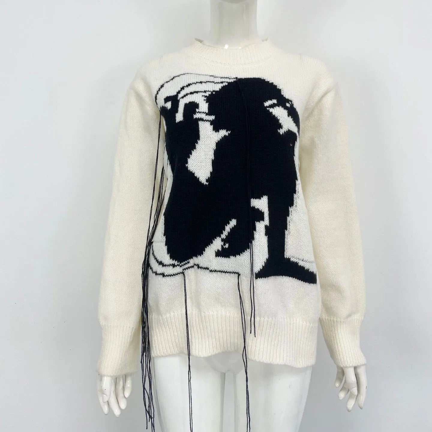 Women's grey alpaca wool sweater with abstract pattern and tassel design on regular sleeves