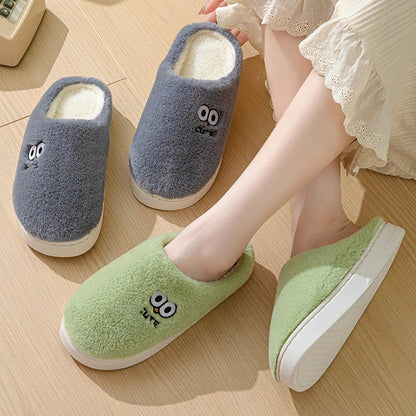 Cozy cartoon slippers with big eyes, available in various colors and sizes for couples to enjoy at home