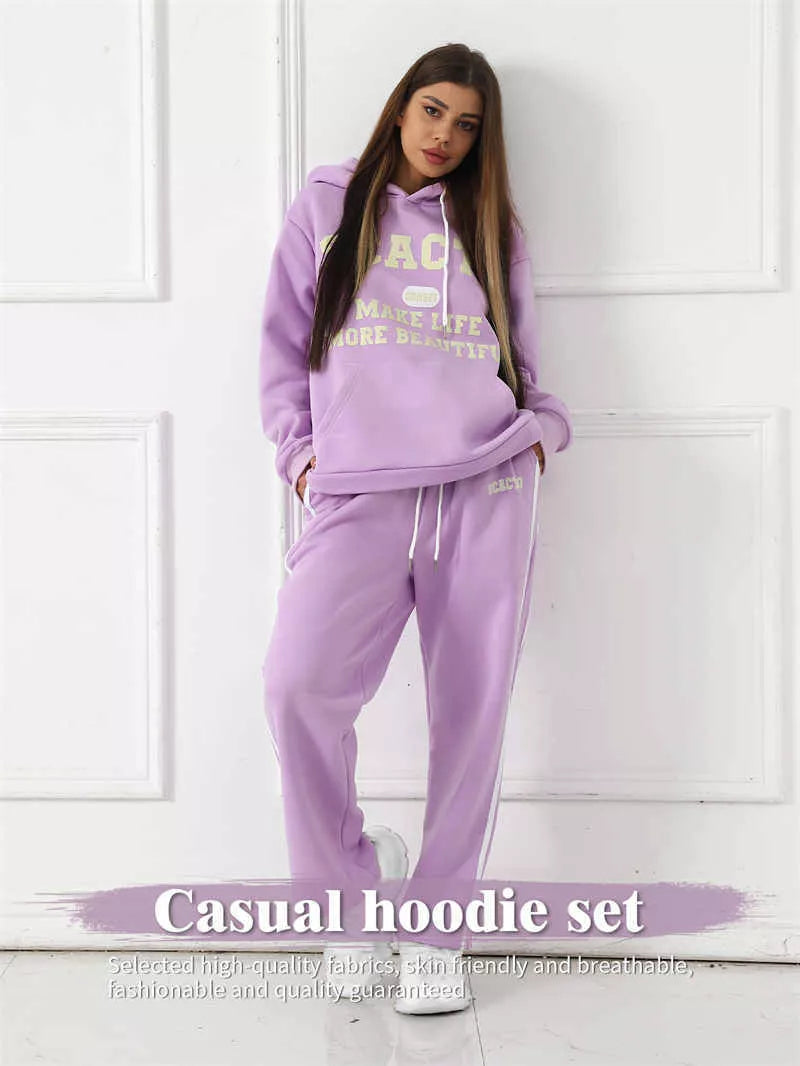 Women's casual printed top and pants set in polyester, available in black, pink, and purple