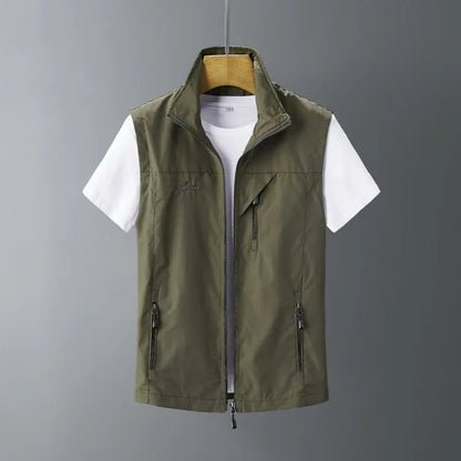 Man wearing a slim-fit army green rabbit fur waistcoat with a hood, showing the texture and fit.