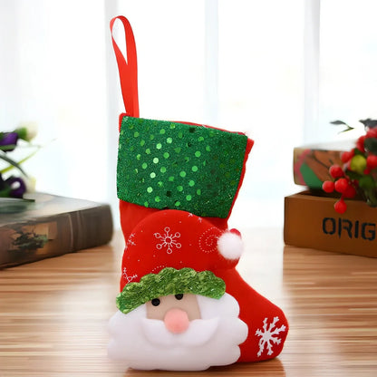 Christmas stocking gift bag measuring 10x20cm with festive character designs