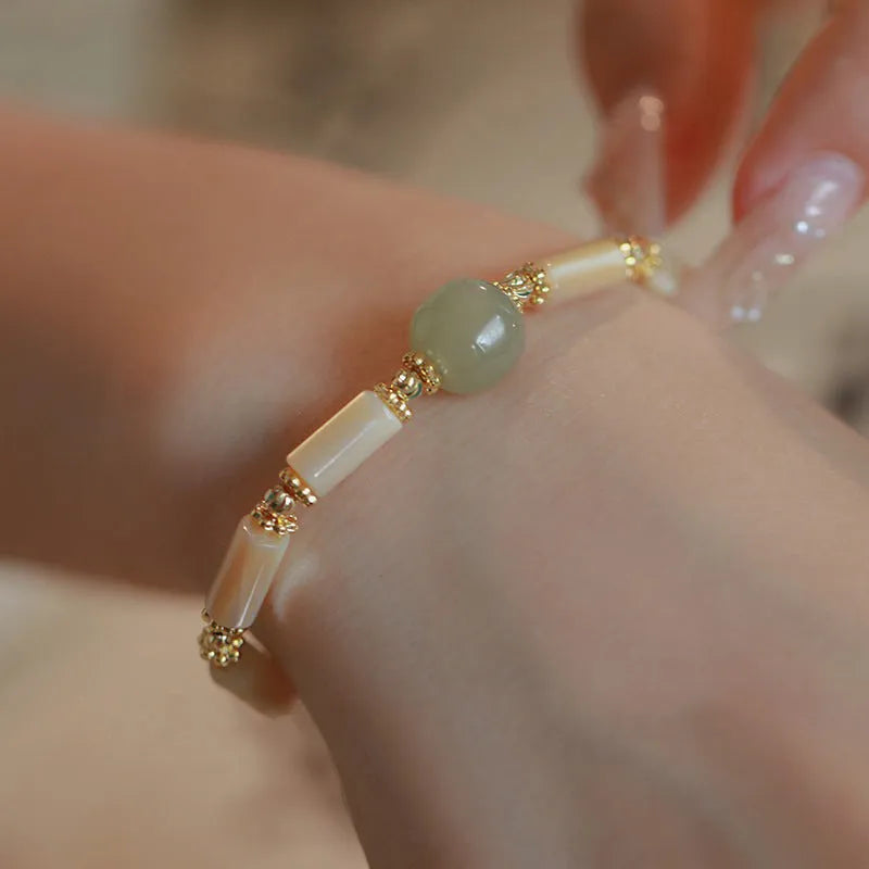 Women's Hetian Jade white lip shell bracelet with geometric round beads