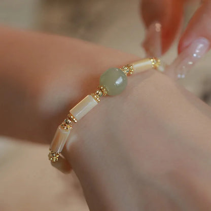 Women's Hetian Jade white lip shell bracelet with geometric round beads