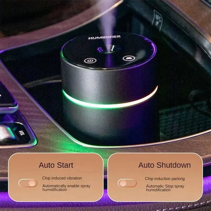 Black aluminium portable car humidifier and essential oil diffuser with night light on desk
