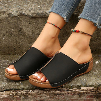 Trendy wedge sandals for women in various colors, featuring a unique European-inspired design, cushioned footbed, and non-slip sole for comfort and style.