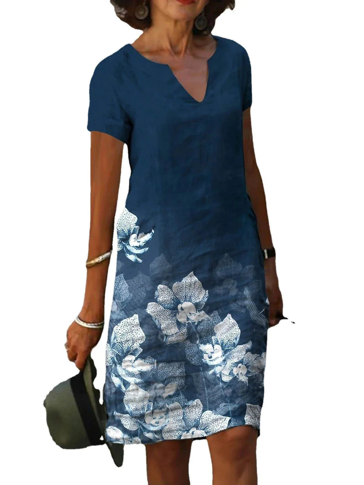 Stylish floral printed mid-length dress made with a cotton-linen blend fabric for a comfortable and feminine look.