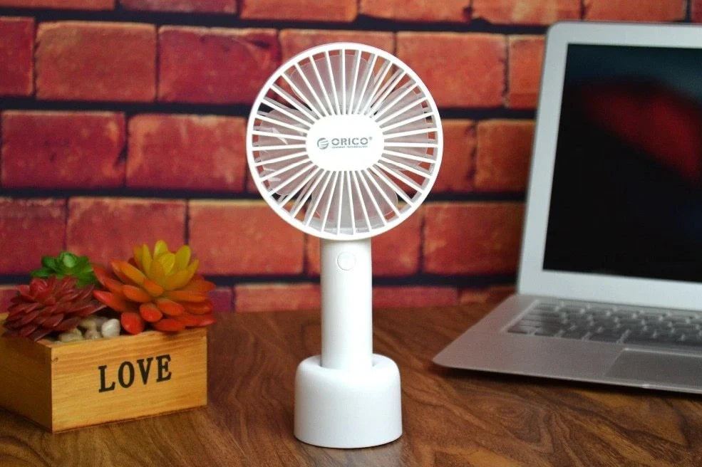 White ORICO FH1 USB rechargeable desk fan with fine-line detailing showing compact 215mm design