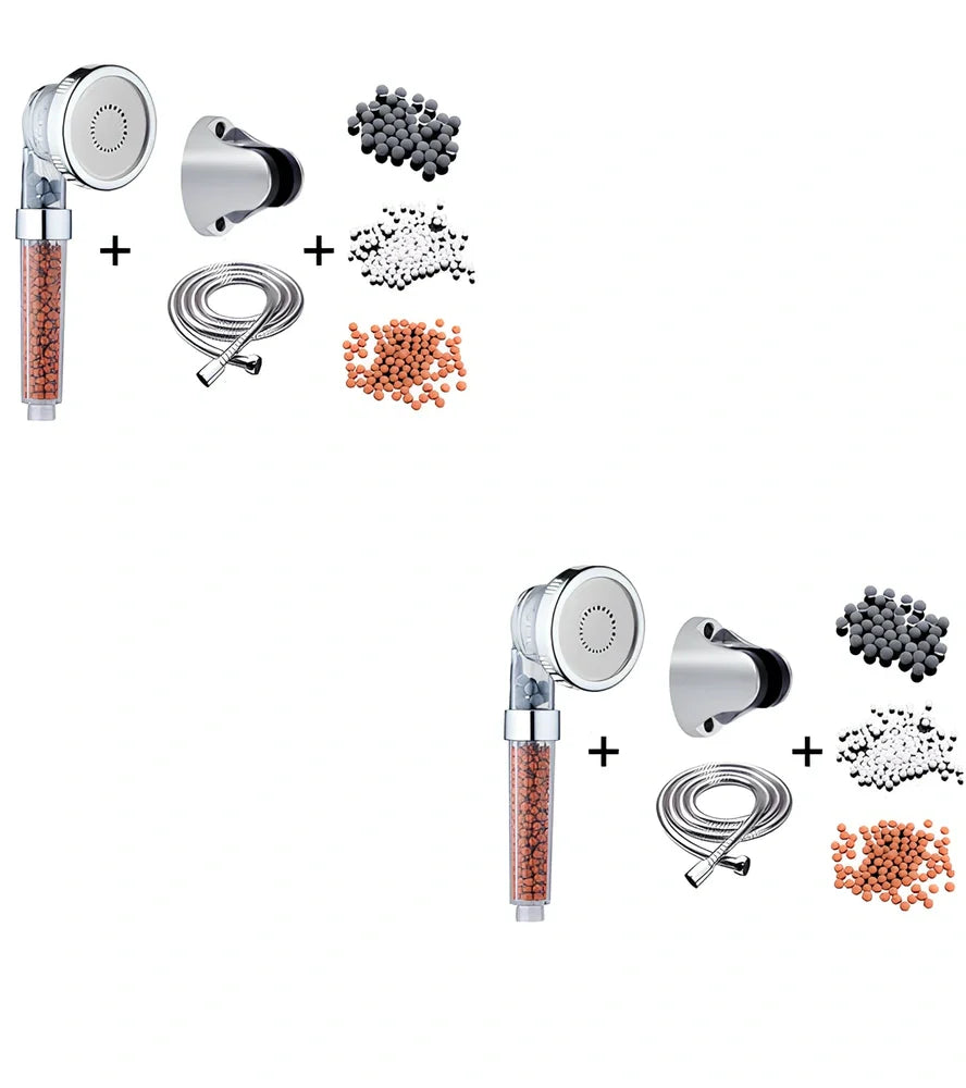 Pressurised shower head with stainless steel panel showing three water mode settings and removable nozzles