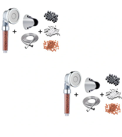 Pressurised shower head with stainless steel panel showing three water mode settings and removable nozzles