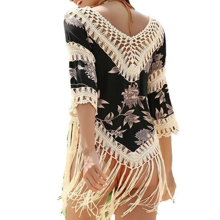 Women's apricot sun protection blouse with V-neck and hollow-out loose sleeves on a beach.