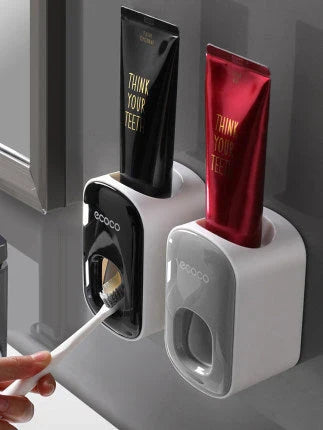 Wall-mounted automatic toothpaste dispenser with toothbrush holder and storage organizer, available in black and grey colors
