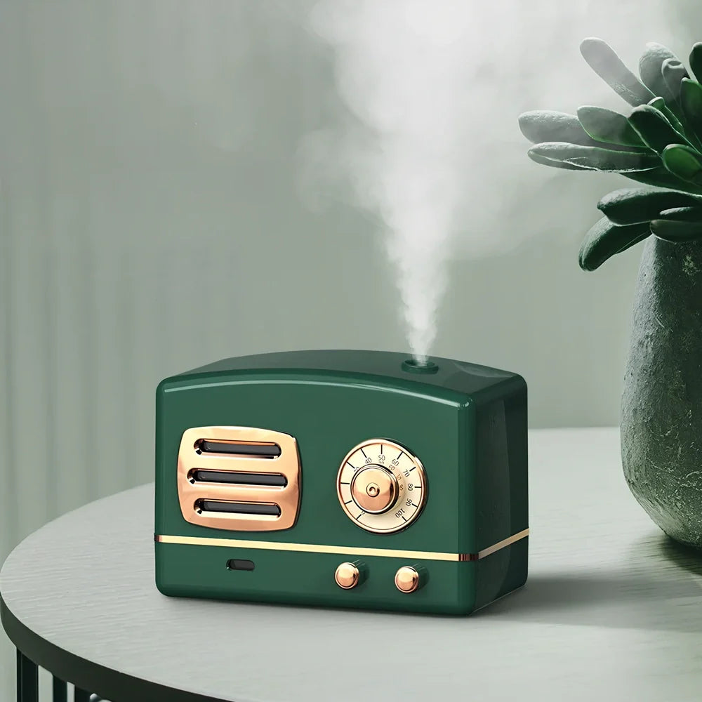 Retro humidifier in green colour with 15cm height and 10cm diameter, showing water tank and control button