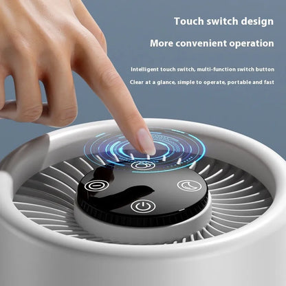 White desktop air purifier with USB cable on a wooden desk