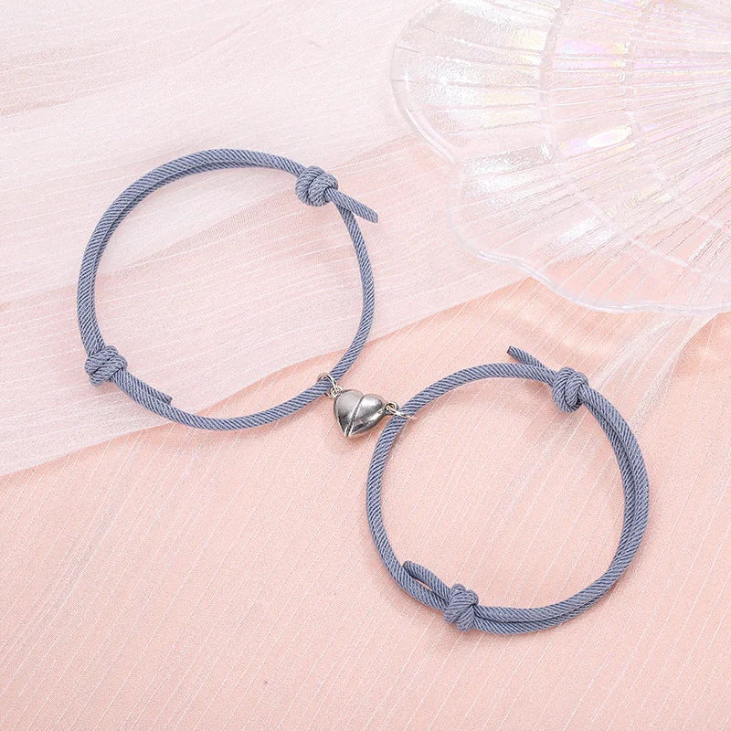 Fashionable magnetic couple bracelets with heart-shaped charms in various color options