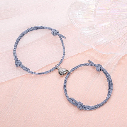 Fashionable magnetic couple bracelets with heart-shaped charms in various color options