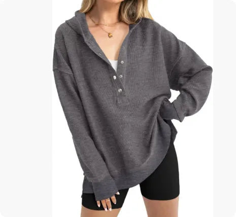 Women's loose raglan sleeve sweater in peacock green colour, showing long sleeves and casual pullover style