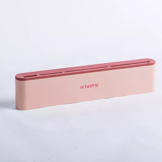 Wall-mounted kitchen knife holder in grey, pink, or light blue, semi-open design for better air circulation