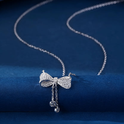 S925 sterling silver bow pendant necklace on an O-ring chain, adjustable from 40cm to 45cm.