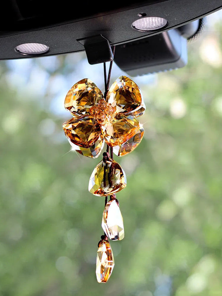 Crystal four leaf grass car interior pendant in transparent, champagne, black, or shiny finish, approximately 20cm long.