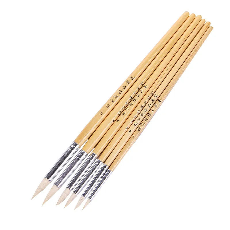 Six wooden pen brushes with pointed hook line design and wool bristles arranged together