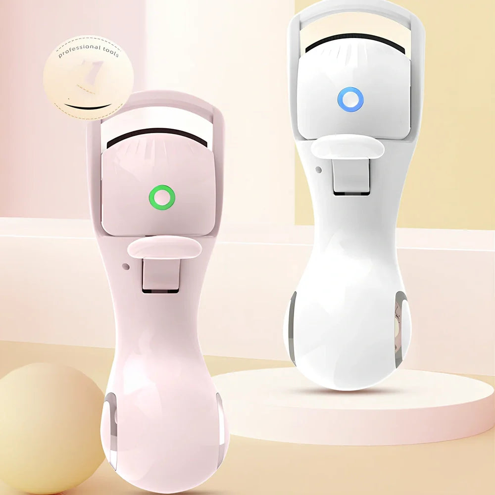 Pink and white electric eyelash curler with USB charging cable and temperature control buttons