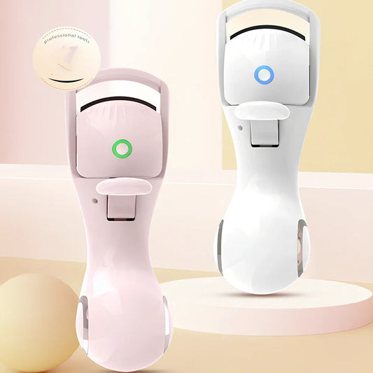 Pink and white electric eyelash curler with USB charging cable and temperature control buttons