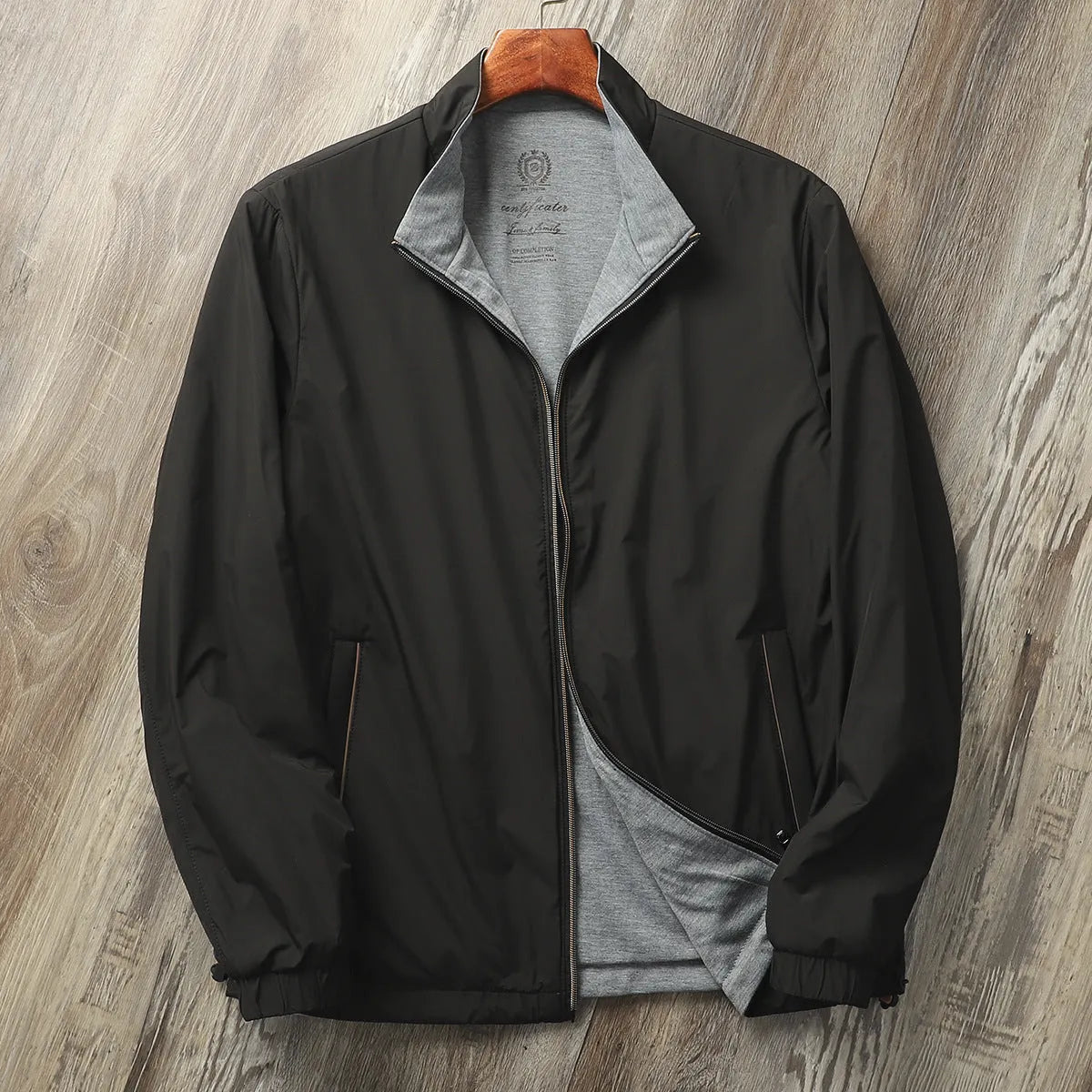 Men's simple stand collar casual jacket in army green, shown on a model.
