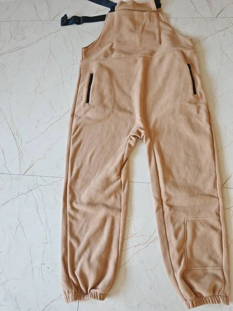 Premium polar fleece jumpsuit in various colors, featuring adjustable suspenders and a wide waistband for a customized fit.
