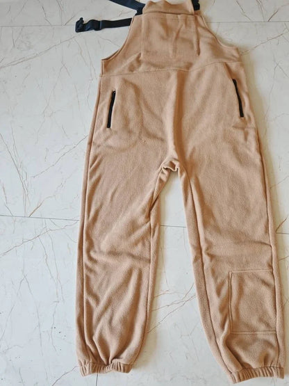 Premium polar fleece jumpsuit in various colors, featuring adjustable suspenders and a wide waistband for a customized fit.