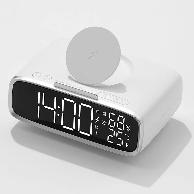 White Bluetooth speaker wireless charger with night lamp functions on wooden surface