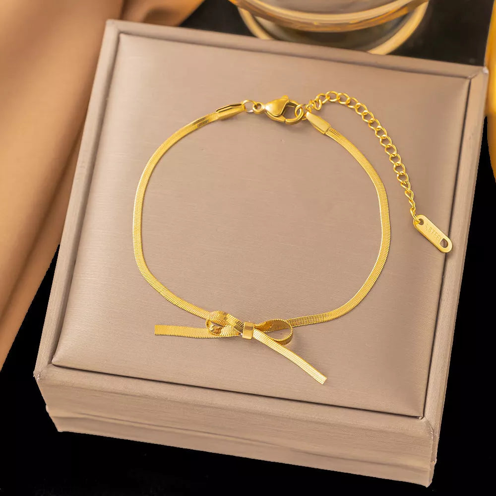 Trendy bowknot stainless steel gold plated snake chain necklace for women